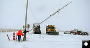 Opening the highway gate. Photo by Wyoming Department of Transportation (WYDOT).