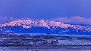 First Light On Triple Peak. Photo by Dave Bell.